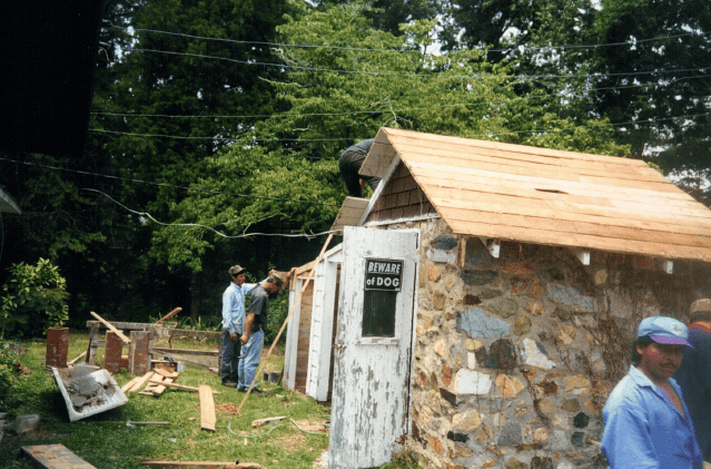 men working on the rock house